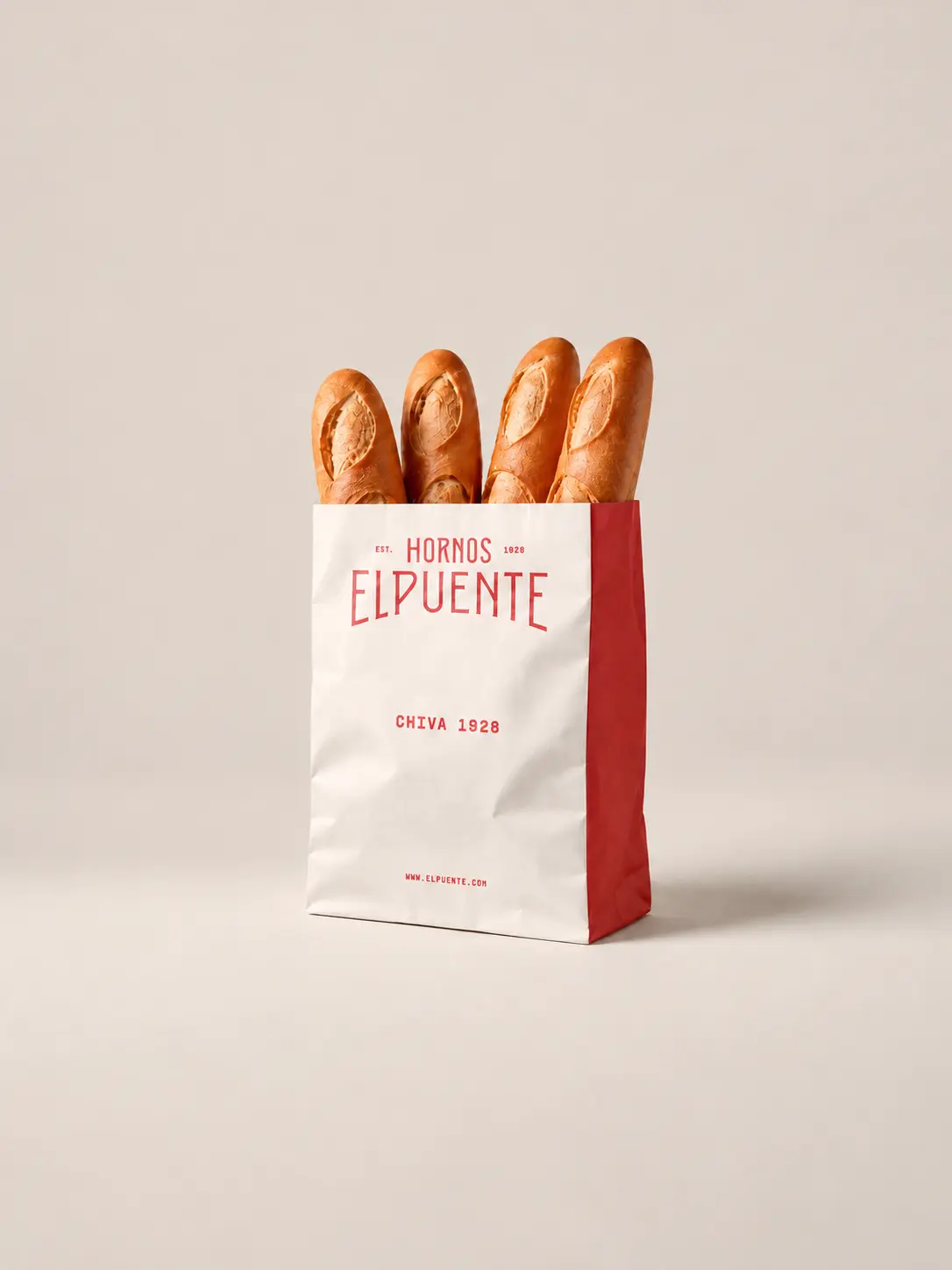 Bolsa de papel grande con el packaging de El Puente
